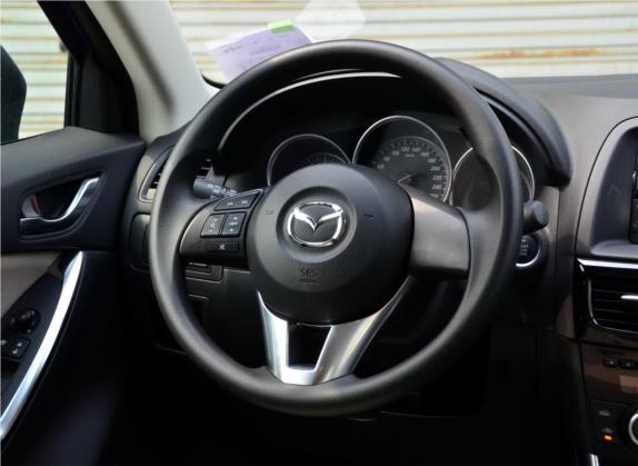 马自达CX-5 2013款 2.0L 手动两驱舒适型 中控类   驾驶位