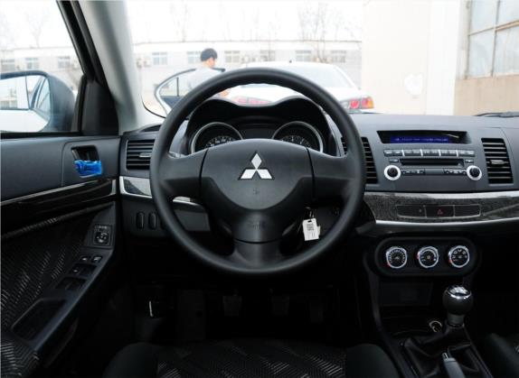 翼神 2013款 时尚版 1.8L 手动舒适型 中控类   驾驶位
